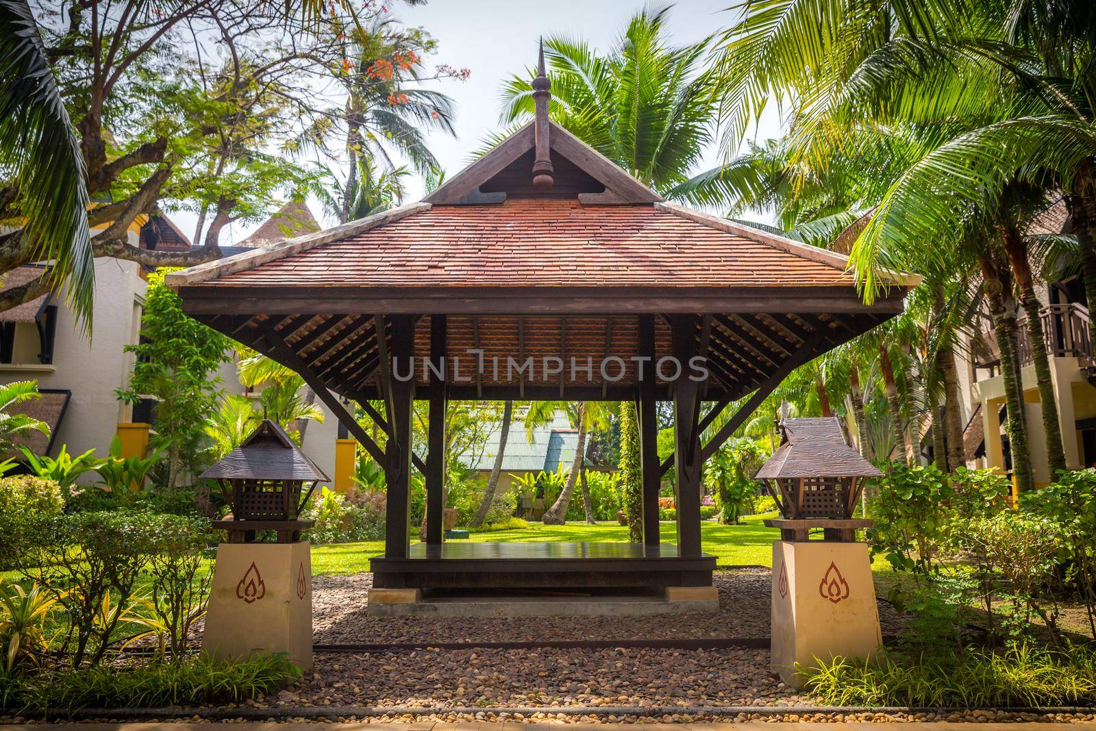 beautiful wooden gazebo in tropical nature in Thailand by Mariakray