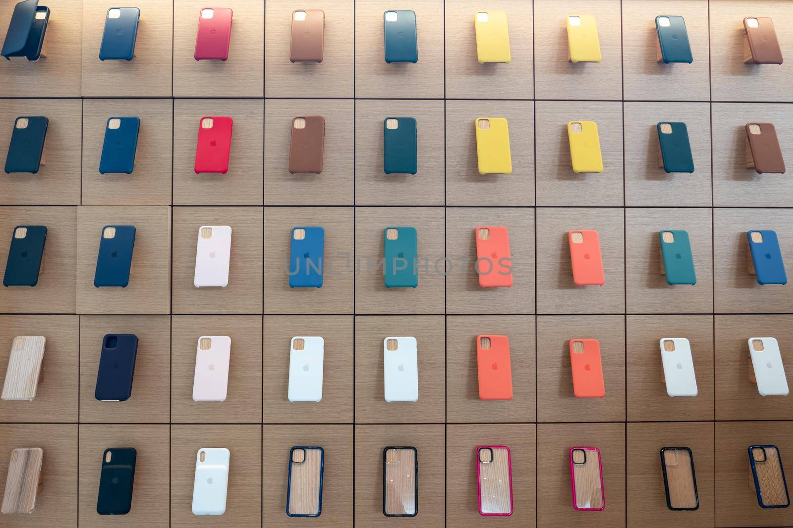 AVENTURA, FLORIDA, USA - SEPTEMBER 20, 2019: Apple iphone 11 series protection cases hanging on the wall in Apple store in the Aventura Mall