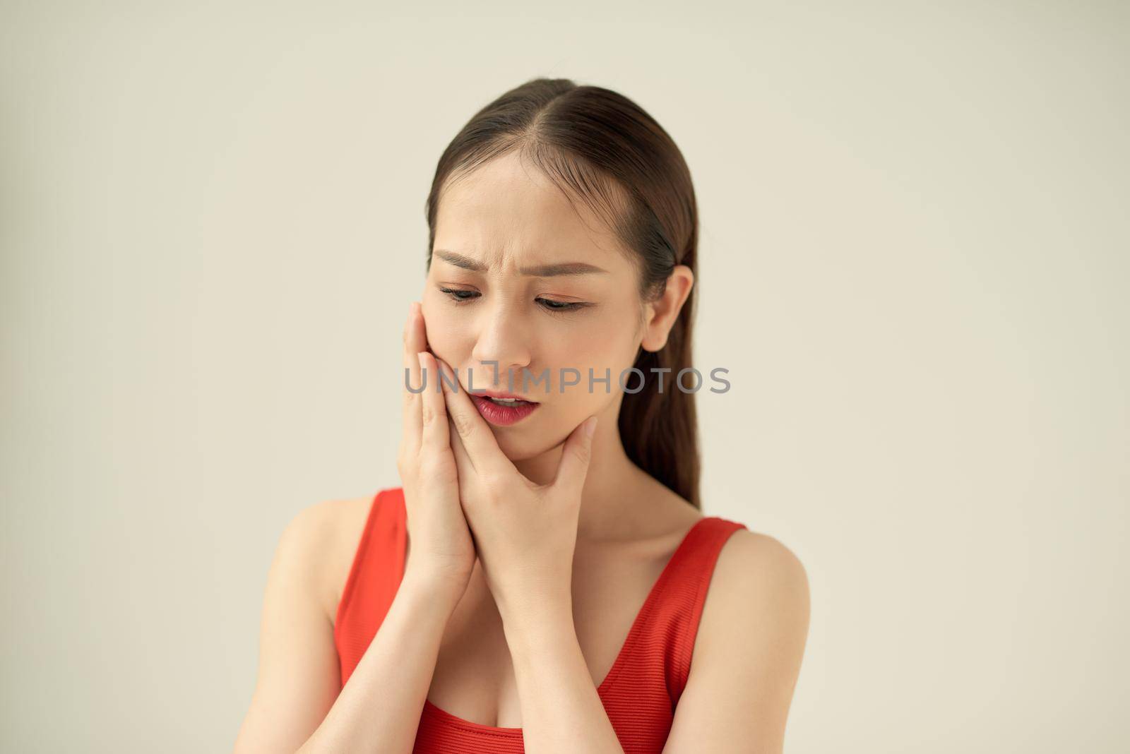 Attractive Female Feeling Painful Toothache. Dental Health And Care Concept by makidotvn