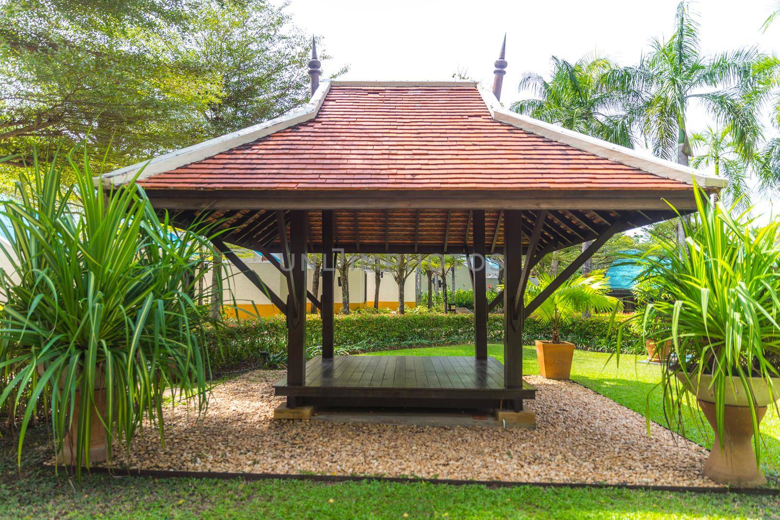 beautiful wooden gazebo in a tropical nature