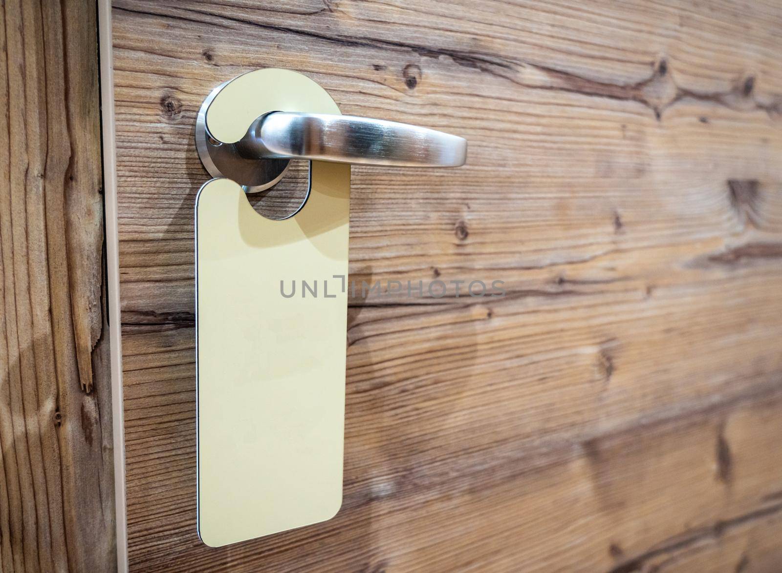 An empty signon the door handle for your text