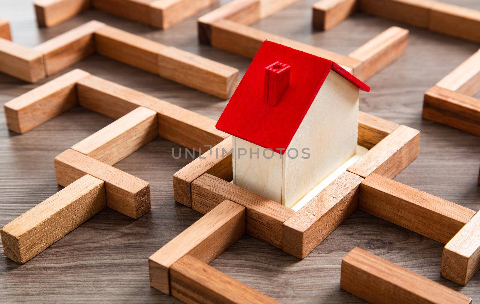 real estate concept, wooden house with maze