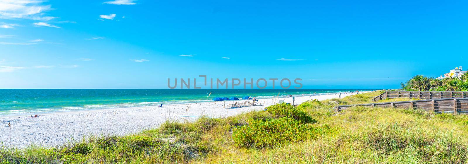 Indian rocks beach with green grass in Florida USA