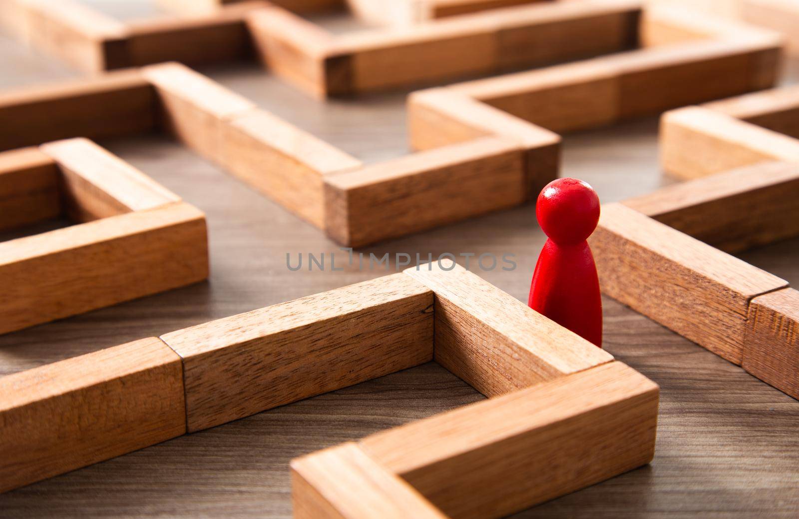 concept photo of standing in a maze and looking for the best way or solution