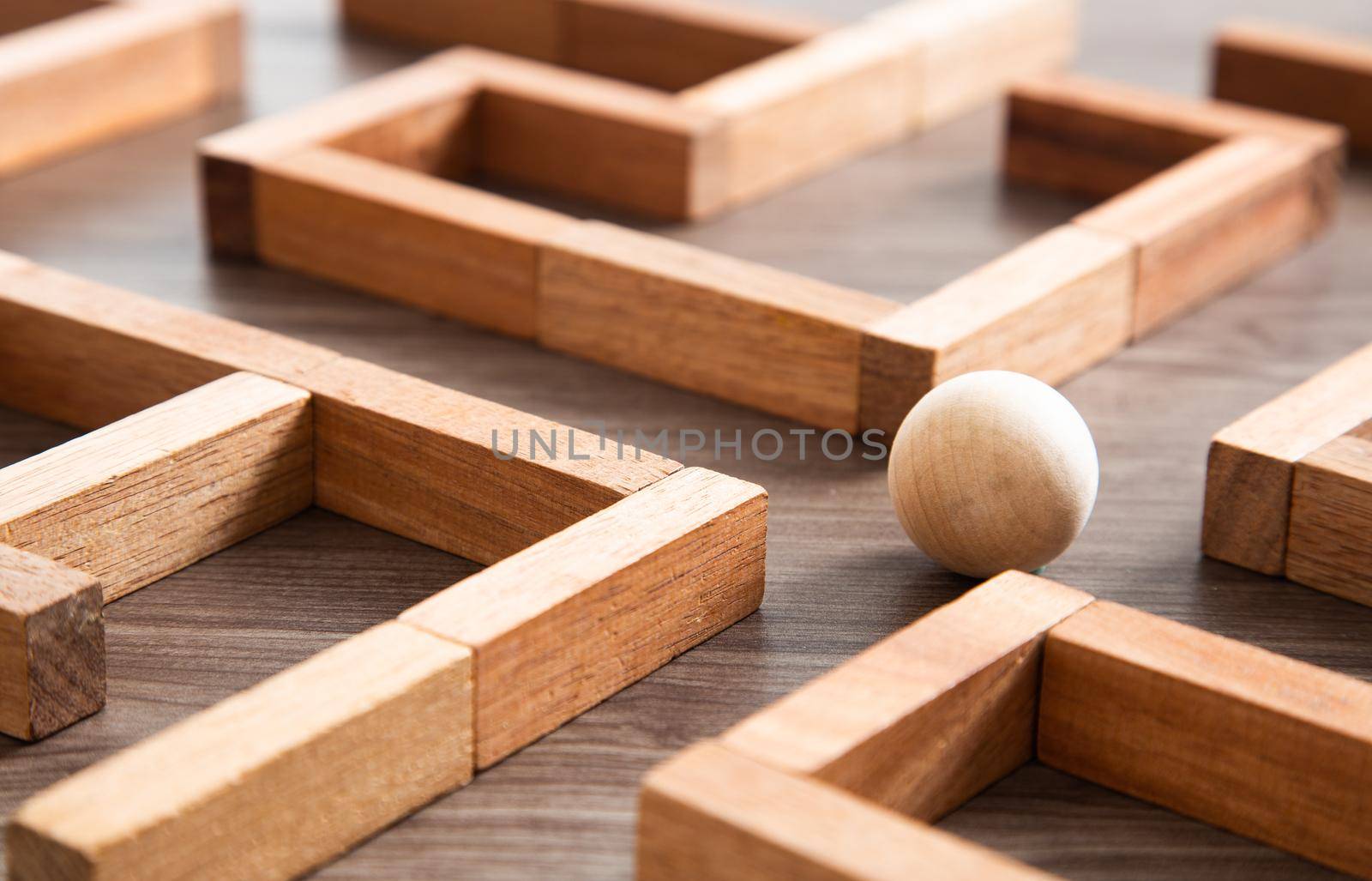 concept photo of standing in a maze and looking for the best way or solution