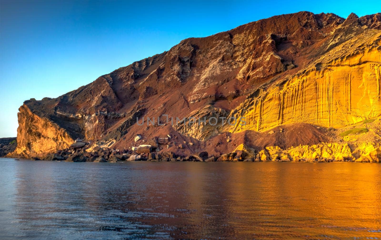 The Linosa volcano called Monte Nero in the beach of Cala Pozzolana di Ponente, Sicily by bepsimage