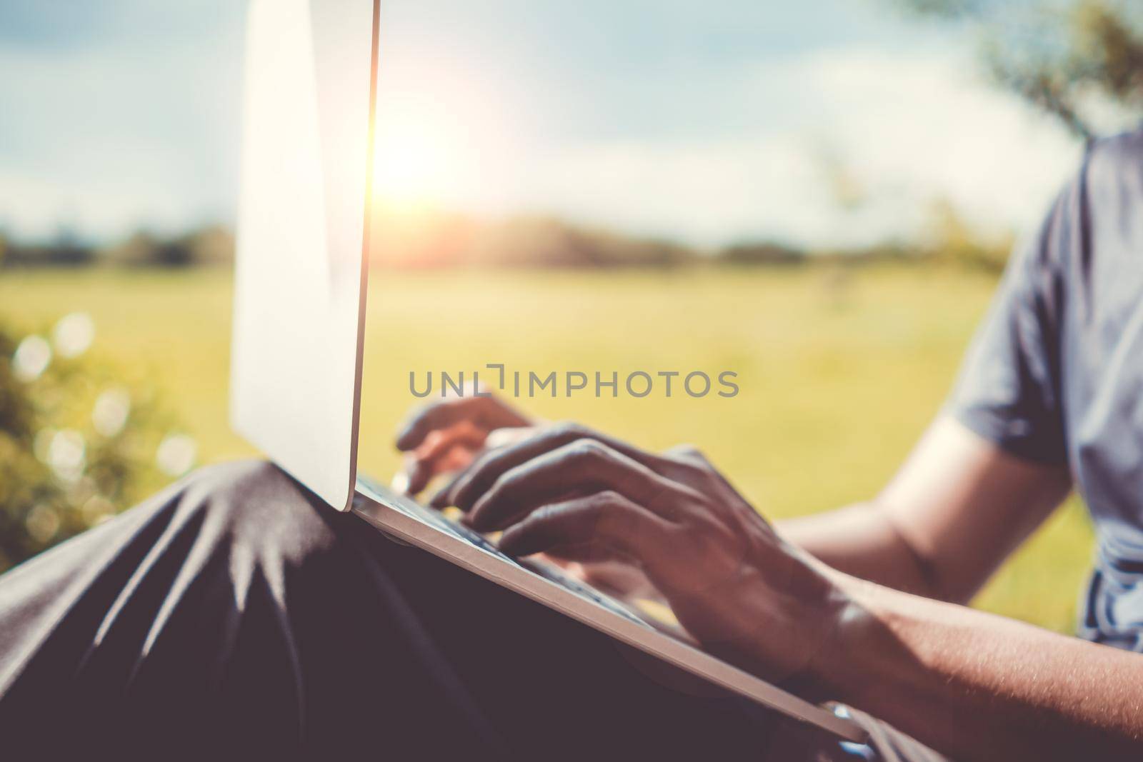 People using laptop to work study on work desk. Business, financial, trade stock maket and social network. by Suwant