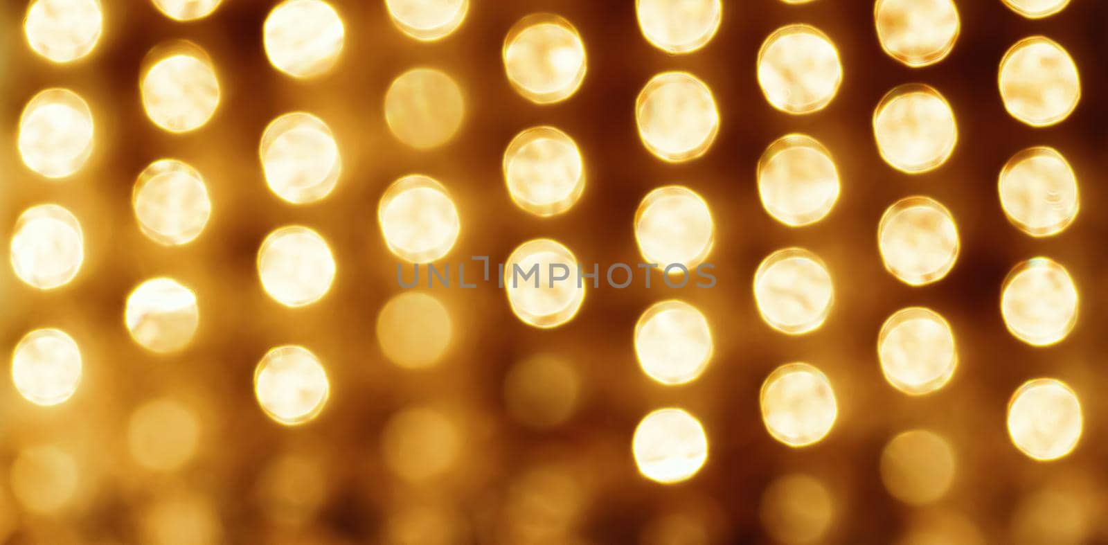 Vintage holiday lights as abstract background for Christmas and New Year design.