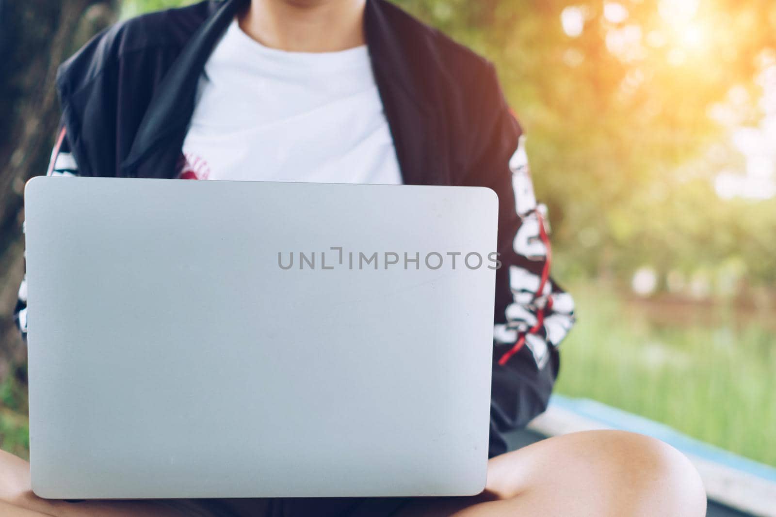 People using laptop to work study on work desk. Business, financial, trade stock maket and social network. by Suwant