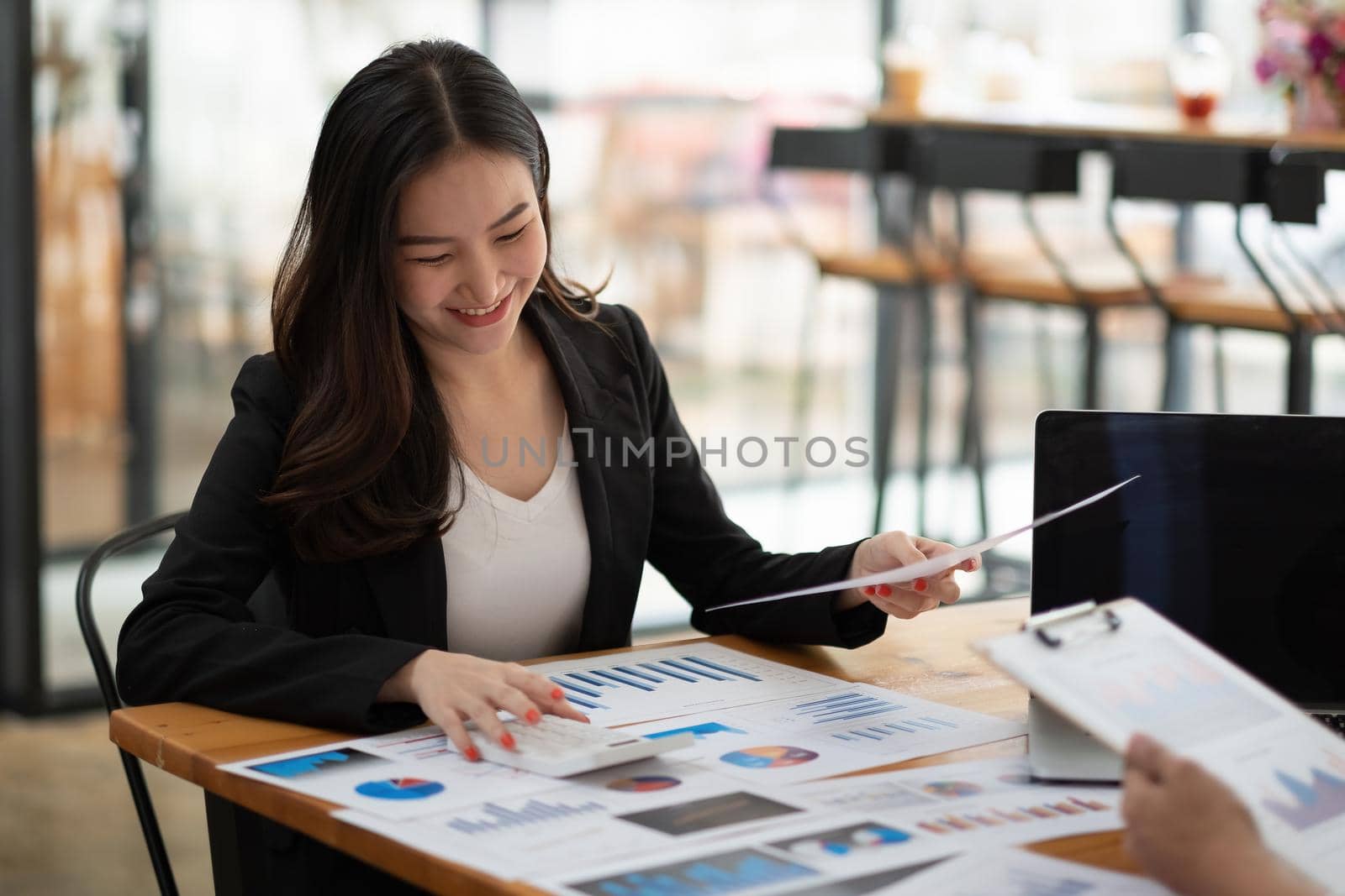 business adviser meeting to analyze and discuss the situation on the financial report in the meeting room.Investment Consultant,Financial advisor and accounting concept.