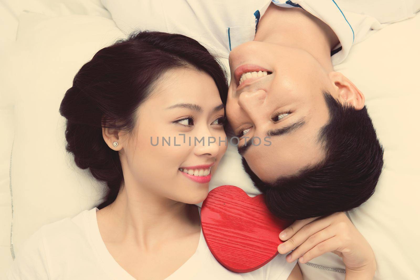 Couple of asian lovers at the beginning of love story having fun together.