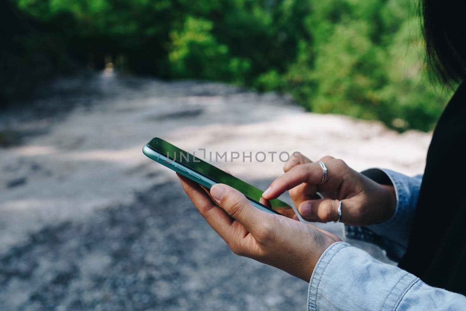 Woman hand using smartphone to do work business, social network, communication concept.