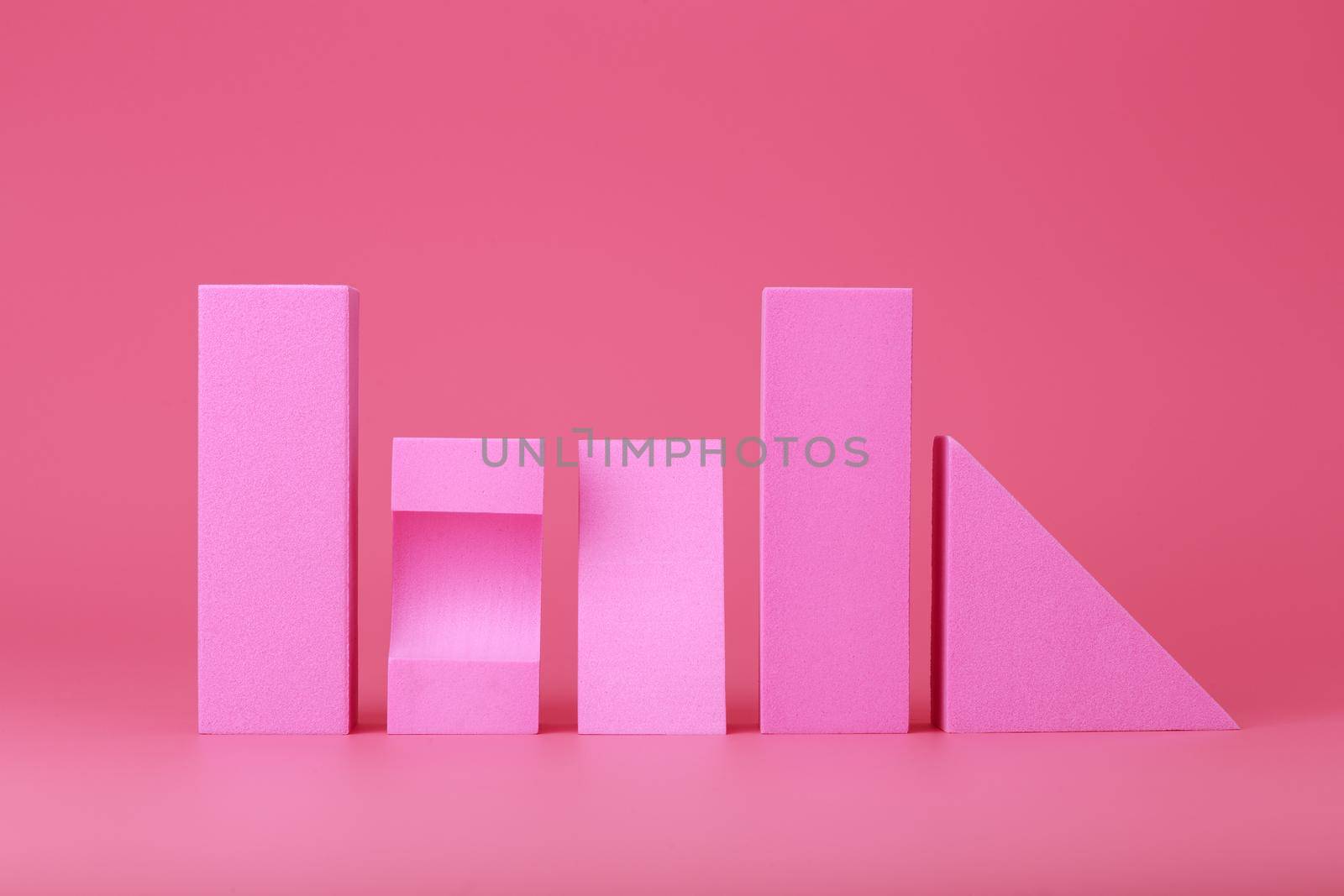 Abstract trendy futuristic background in pink colors with copy space. Monochromatic artsy background with different geometric figures in a row