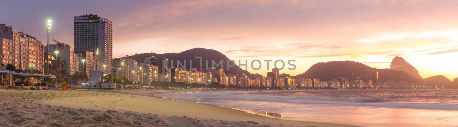 Panorama view of Copacabana and mountain Sugar Loaf sunrise in Rio de Janeiro Brazil