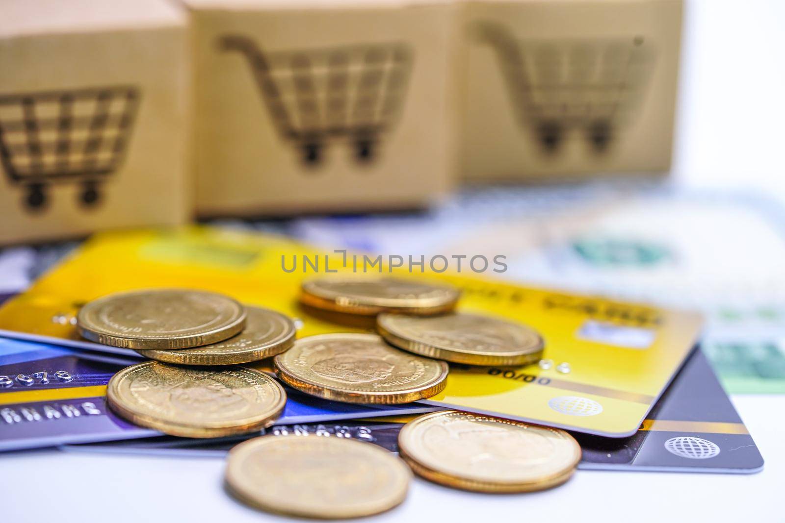 Credit card model and coins with shopping cart box, Financial development, Accounting, Statistics, Investment Analytic research data economy office Business company banking