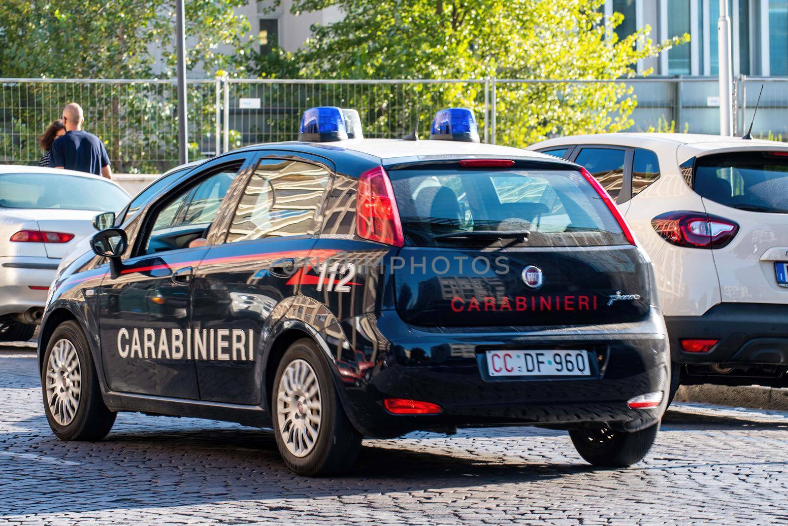carabinieri car that runs along a street in the city center by carfedeph