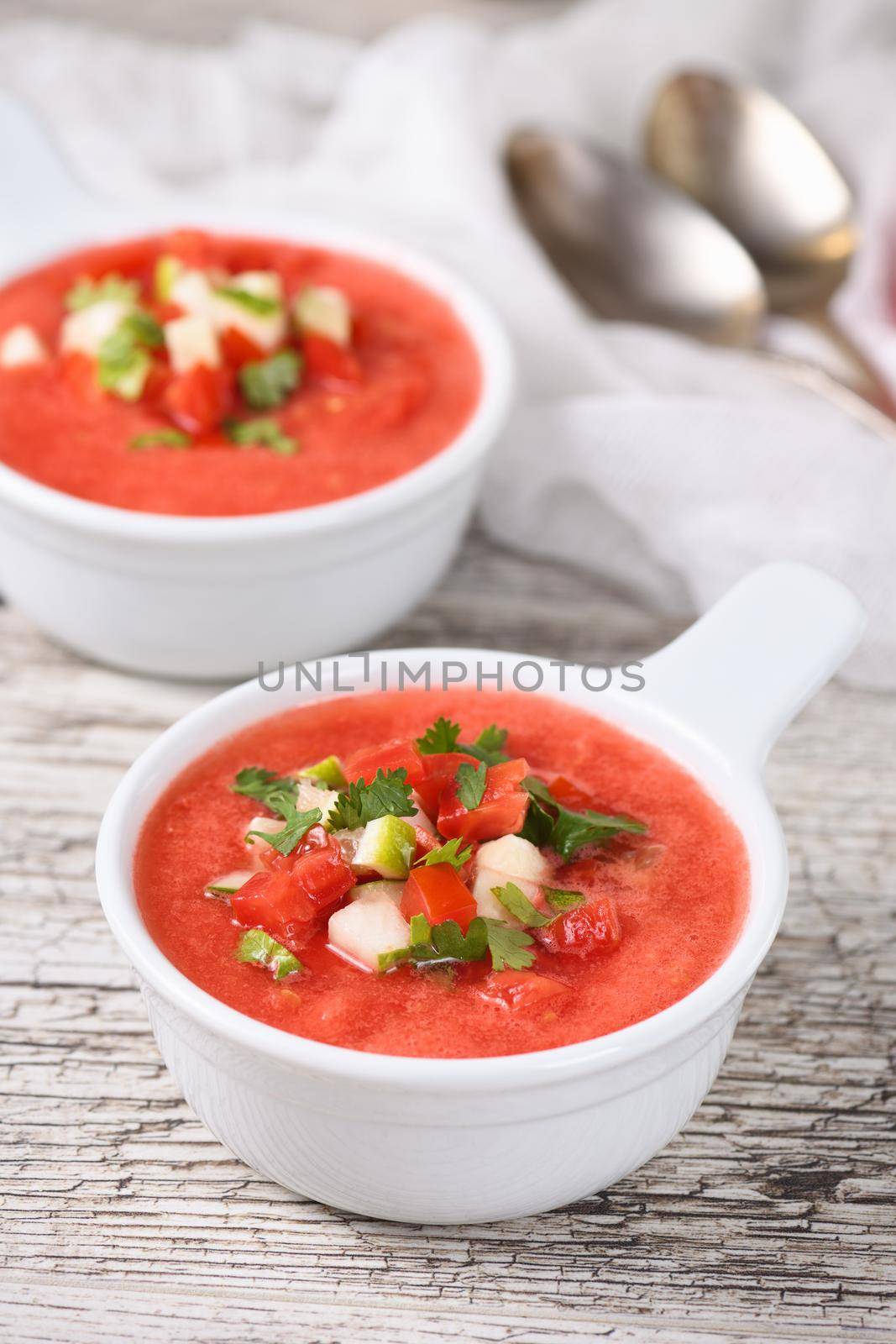 Watermelon tomato gazpacho in bowls. Traditional Spanish cold soup.