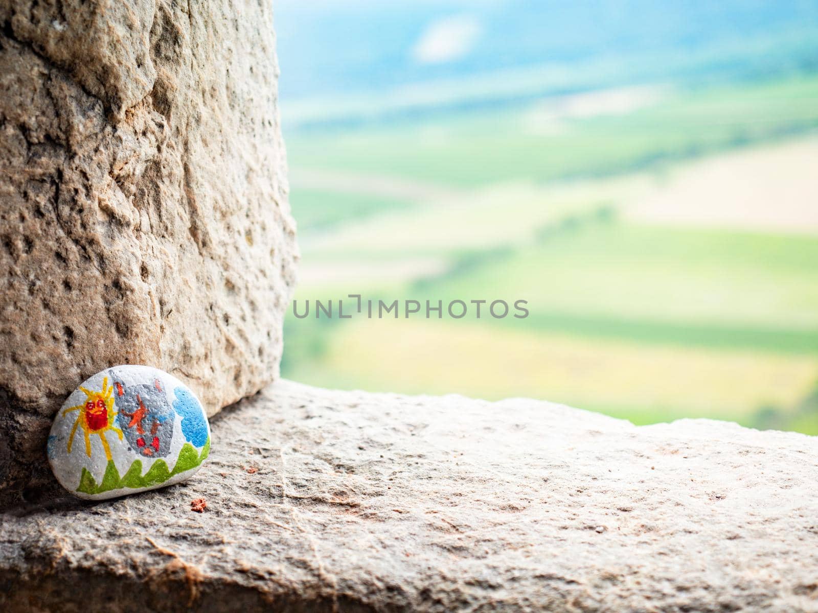 The picture painted on a stone is part of a children's tourist game. by rdonar2
