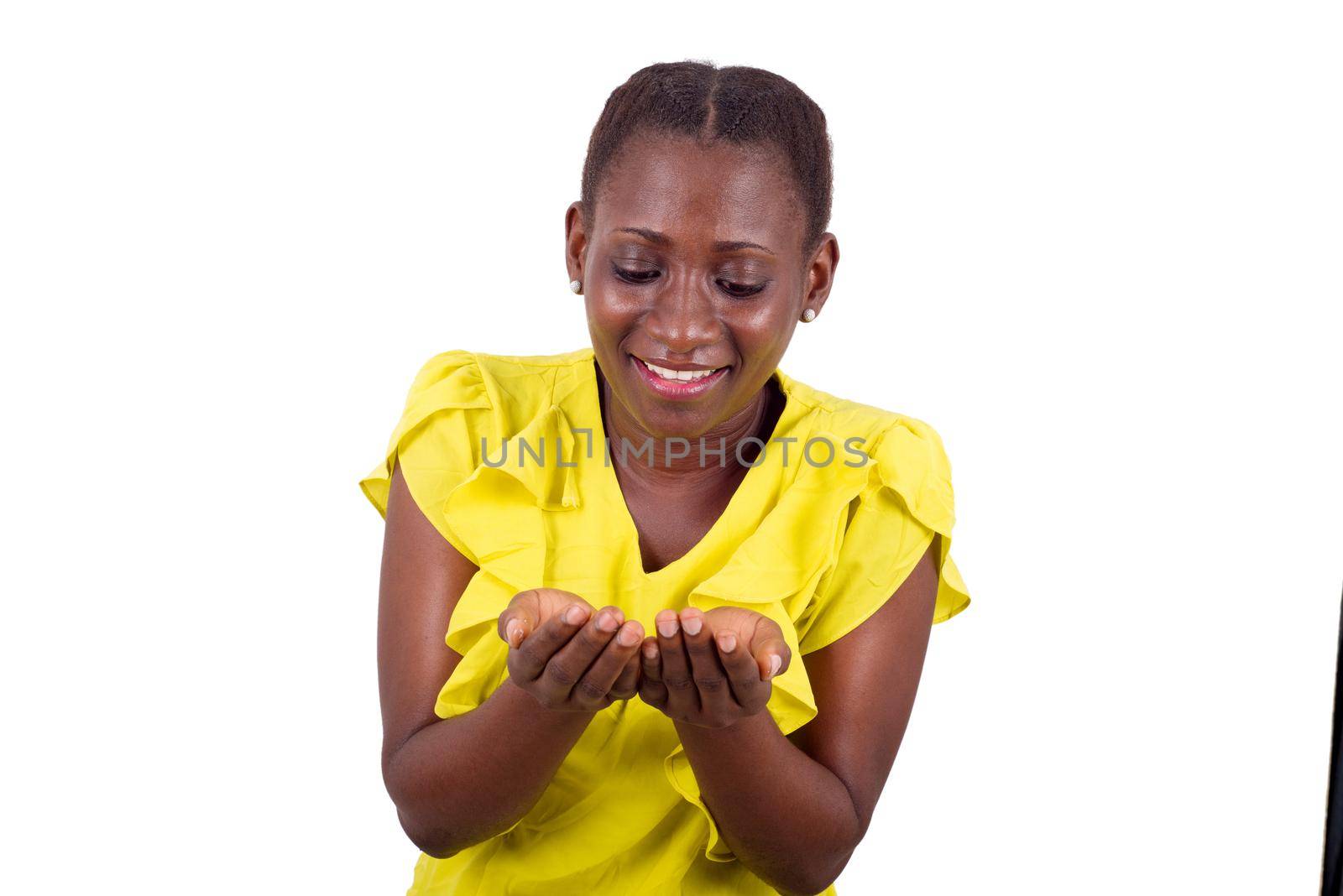 Woman with outstretched hand shows an advertisement on a white background.