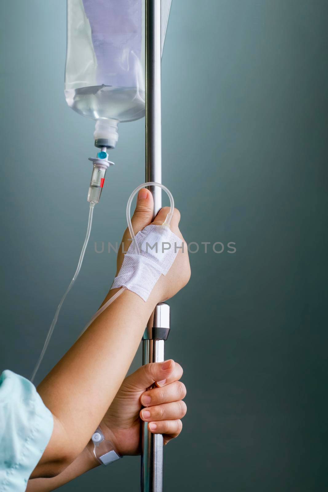 woman patient in hospital with saline intravenous (iv) by toa55