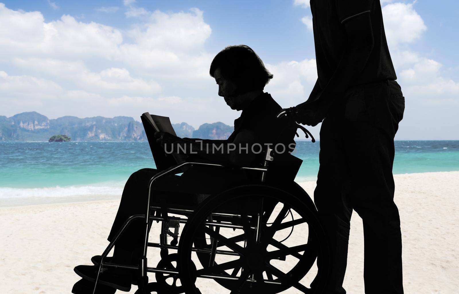 Silhouette elderly woman reading a book on wheelchair with her son take care. by toa55