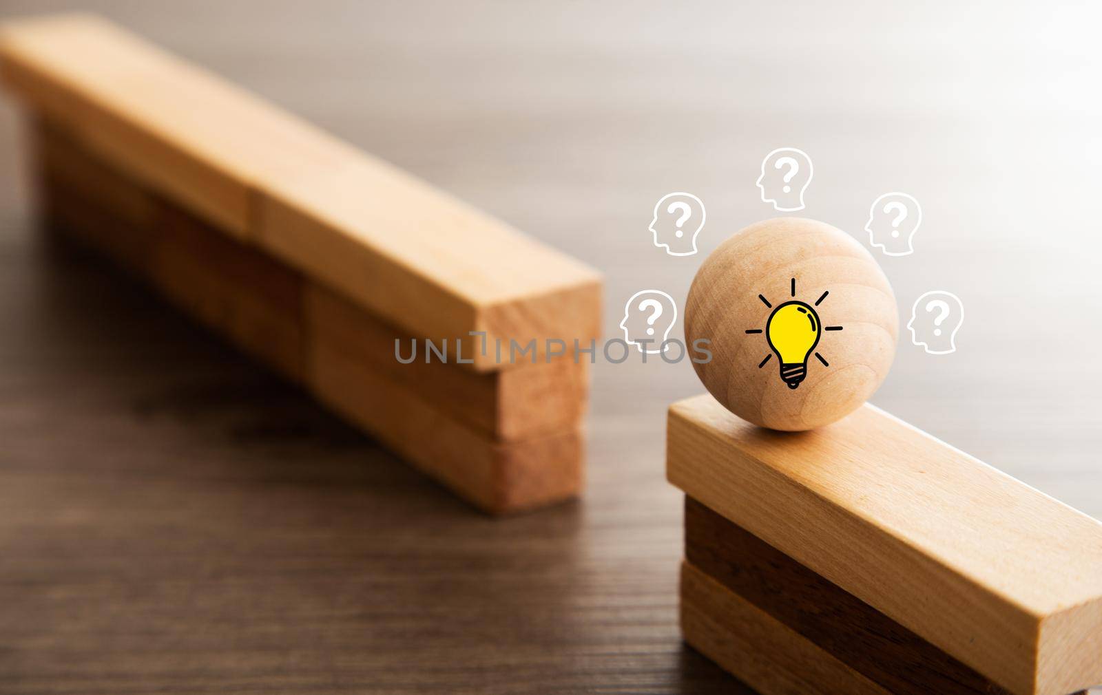 business concept image of challenge. Wooden ball on high wall and needs to be passed to the other side.