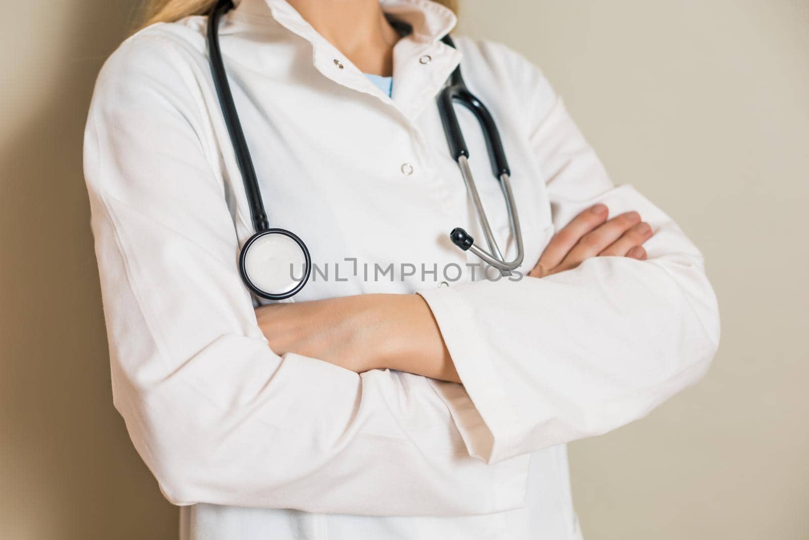 Portrait of female doctor with arms crossed.