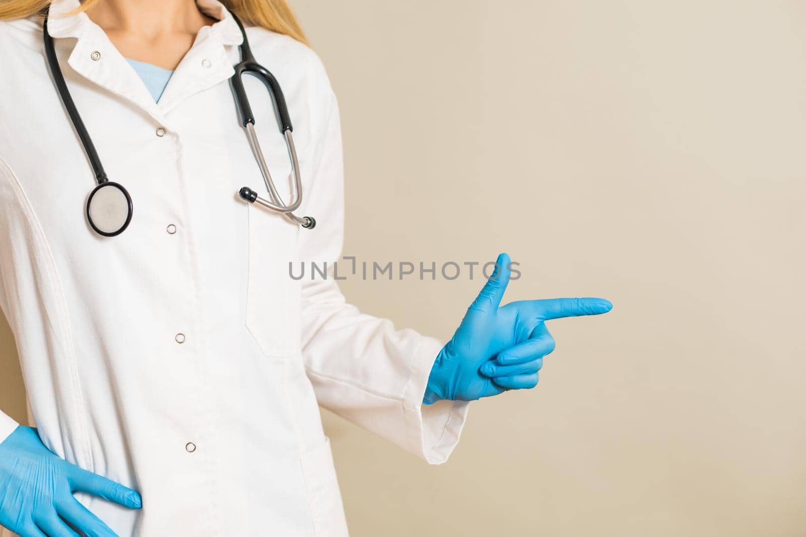 Image of female doctor pointing.