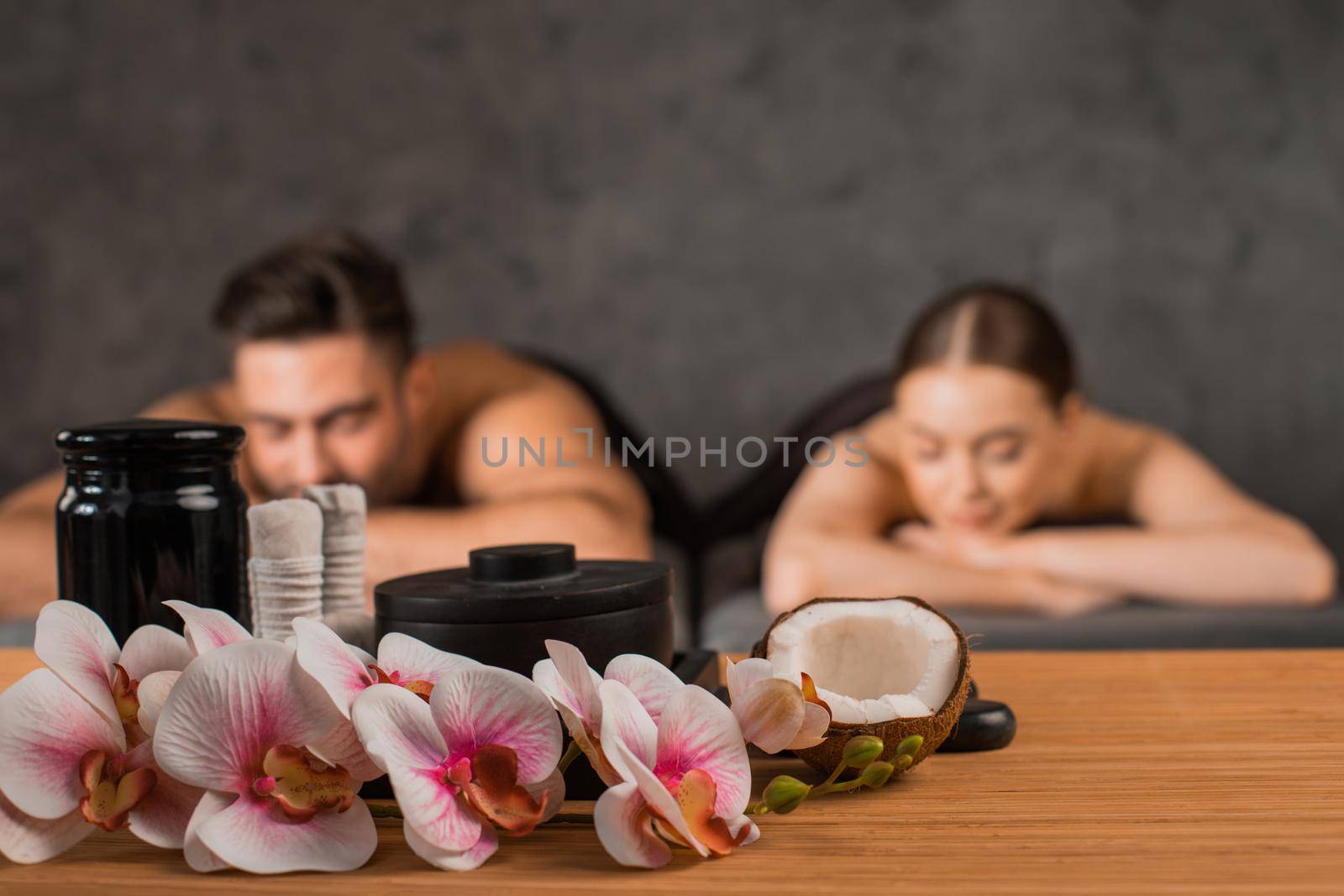 Attractive couple relax at the spa salon. Beauty treatment concept.