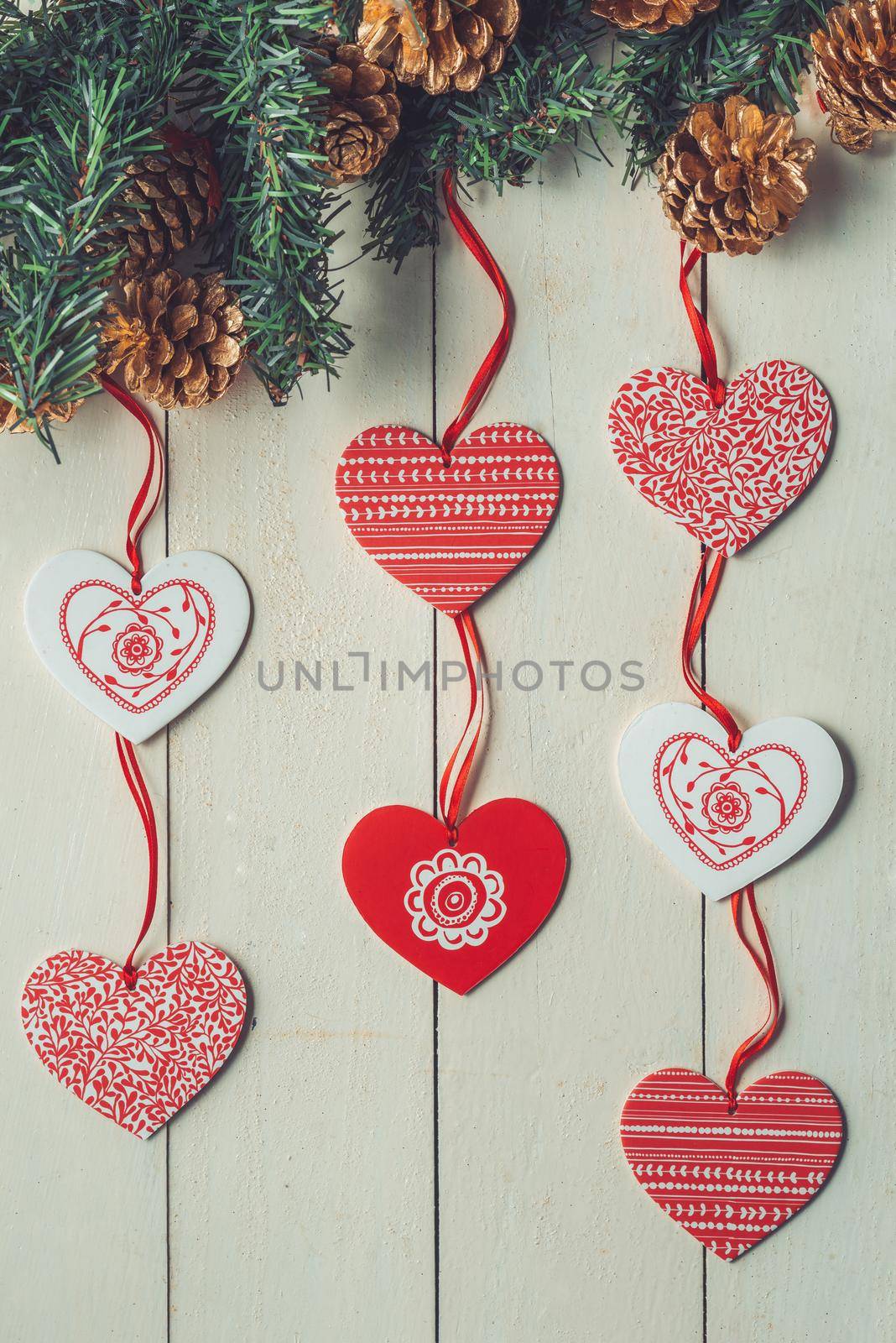 Christmas background with decorations on wooden background. Top view with copy space