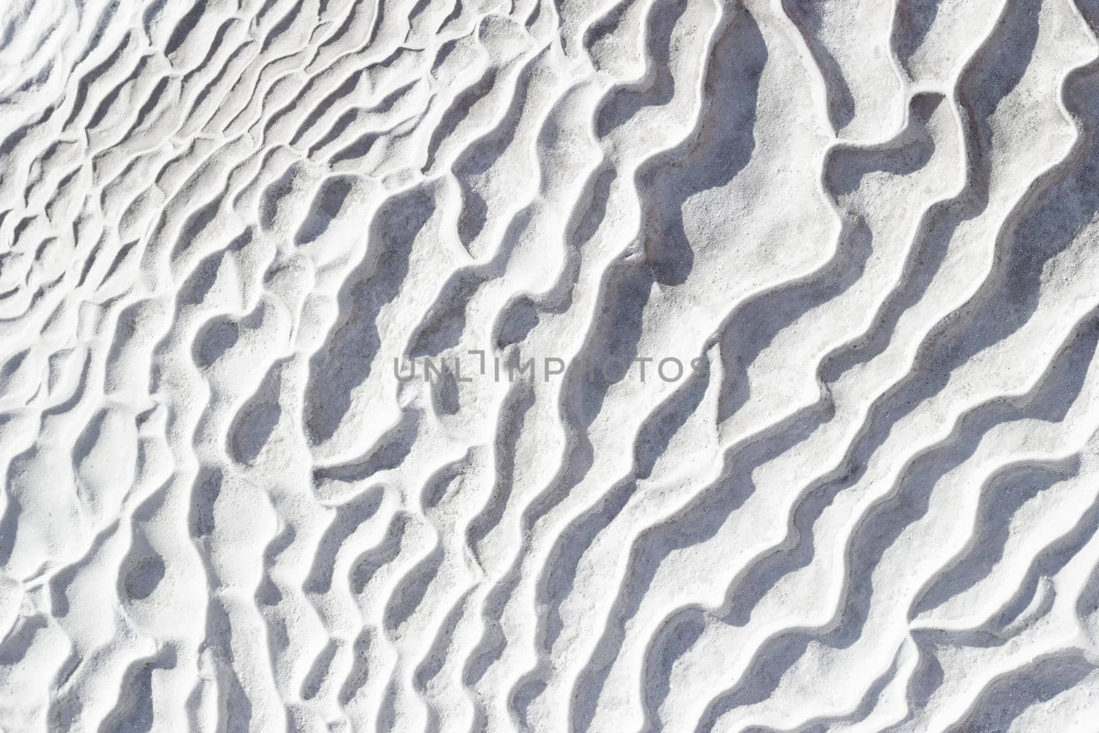 White and gray texture of calcium travertine, pattern of waves by Laguna781