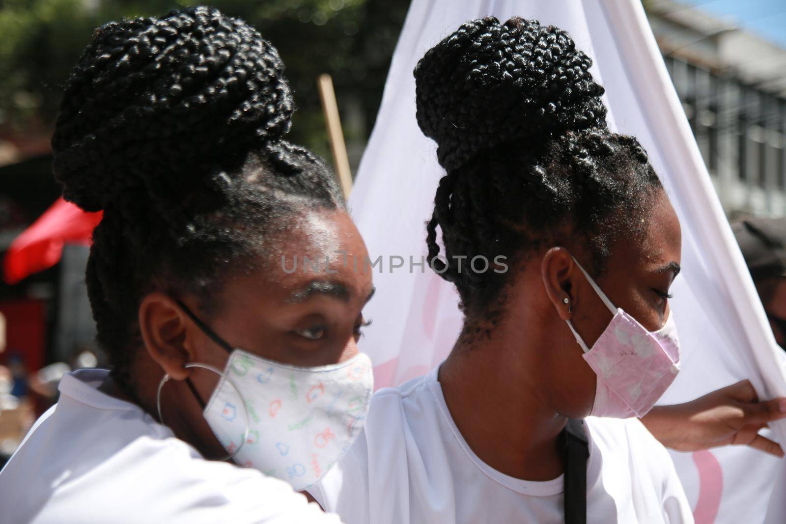 salvador, bahia, brazil - september 7, 2021: young people of black ethnicity wearing hair braids are seen in the city of Salvador.
