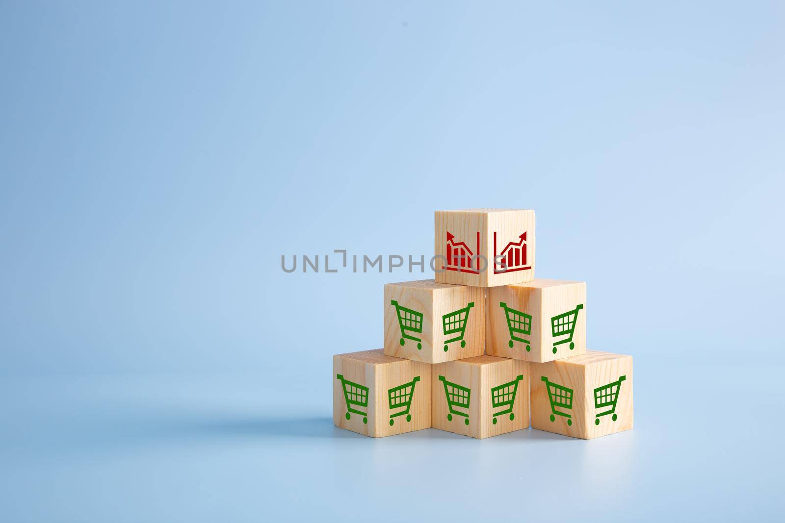 Cube with icon graph and shopping cart symbol. Sale volume increase make business grow by tehcheesiong