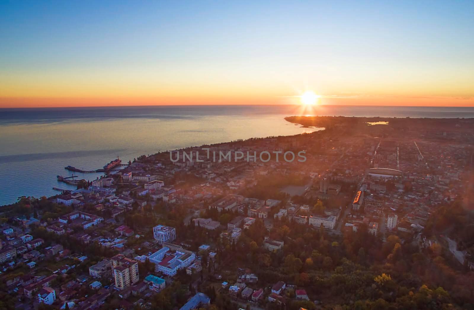 Sukhumi, Abkhazia-September 26, 2017: Top view of the evening city by the sea.