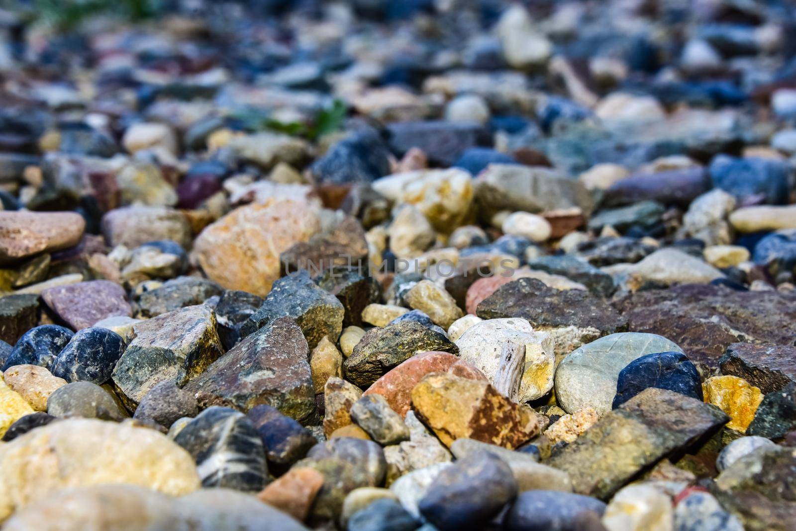 Rocks sea beach or stones background, Many small stones in assorted colors, Abstract rough wallpaper nature concept.