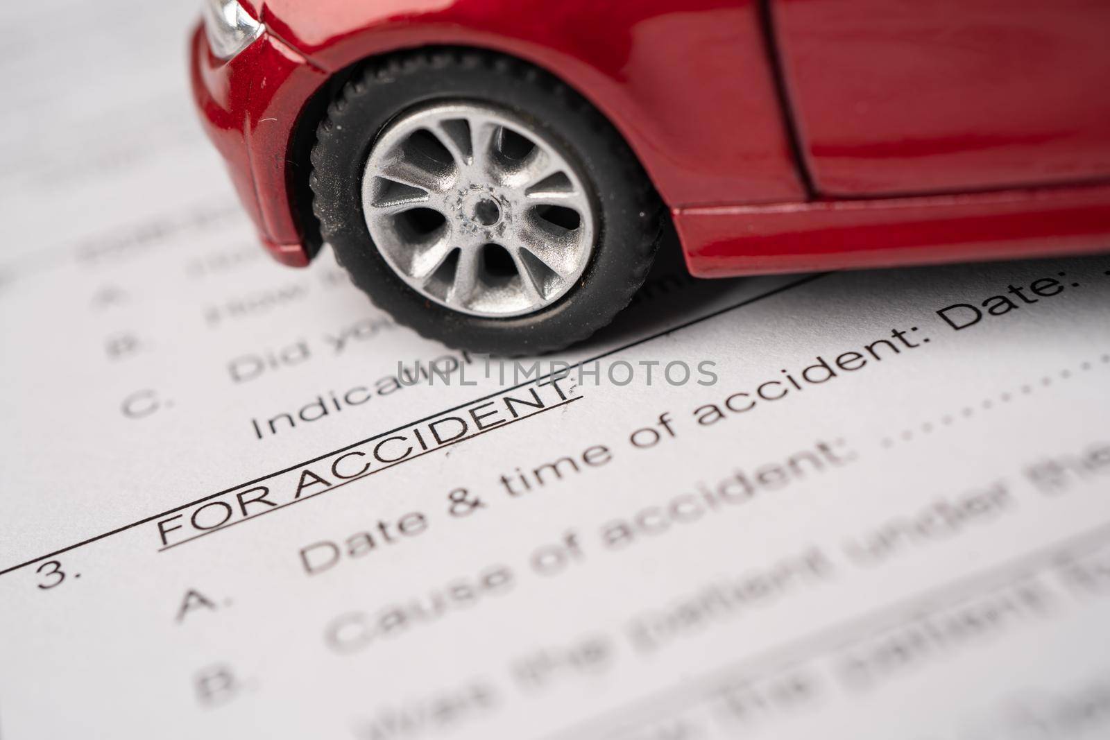 Car on Insurance claim accident form, Car loan, insurance and leasing time concepts. by pamai