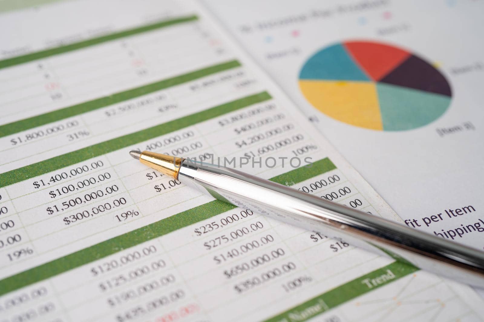 Pen on chart or graph paper. Financial, account, statistics and business data concept. by pamai