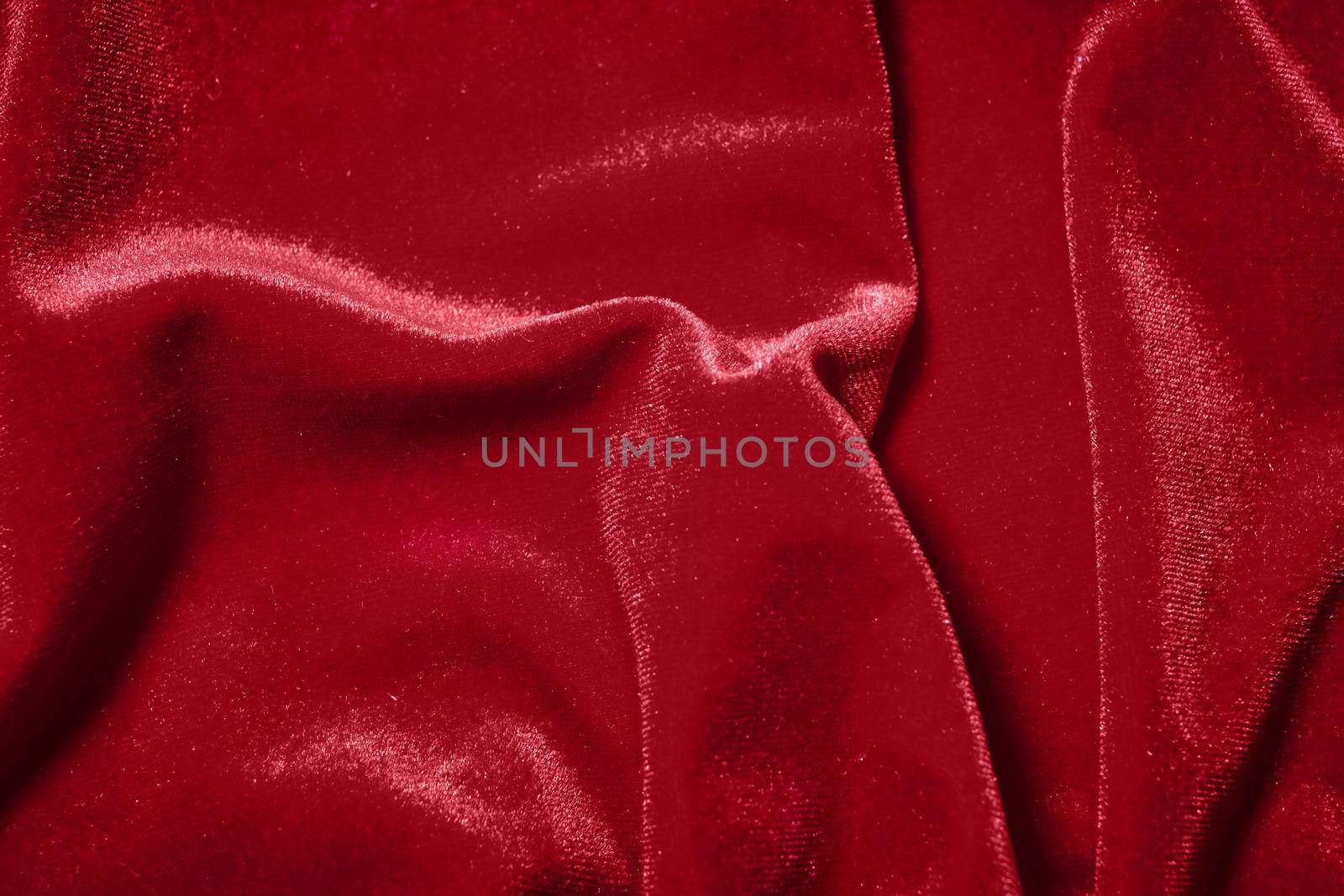 Red velvet texture background.Velvet imitation texture red