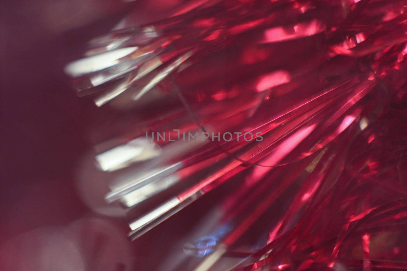 Macro photo of red tinsel
