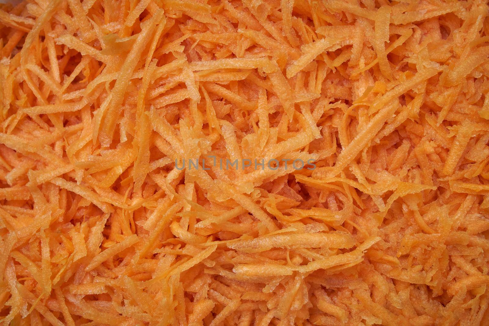 Grated carrot, for backgrounds or textures.Carrots close-up. Homemade food