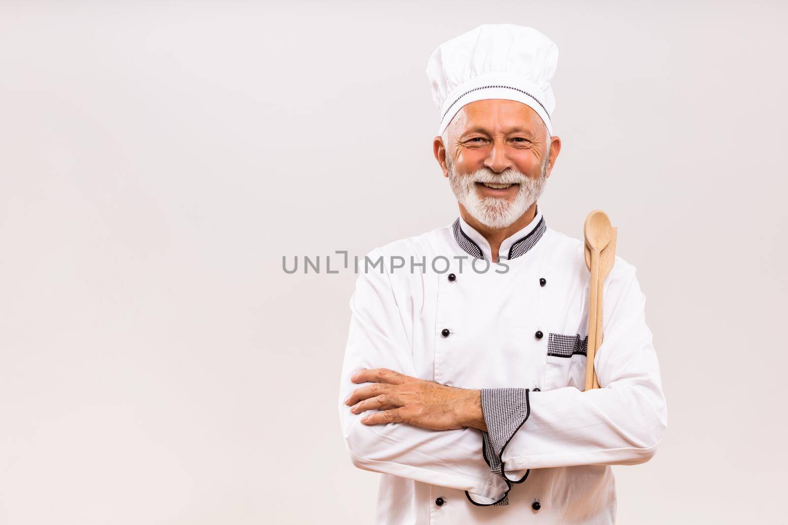 Portrait of  senior chef with work tool by Bazdar