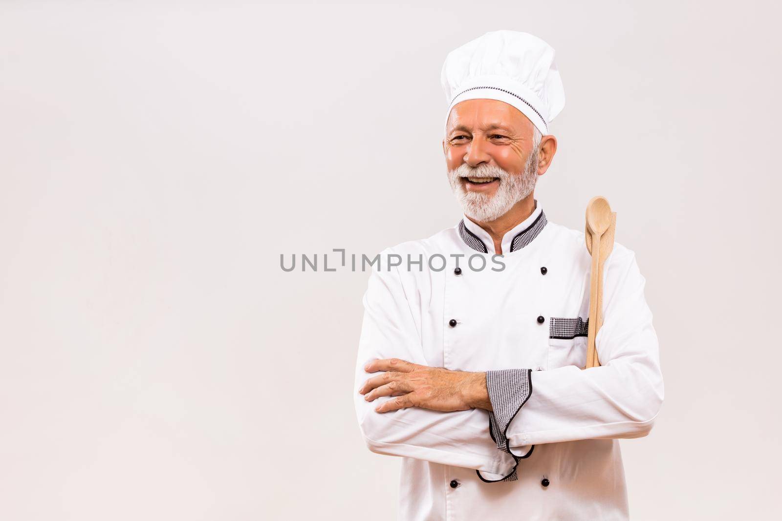 Portrait of  senior chef with work tool by Bazdar