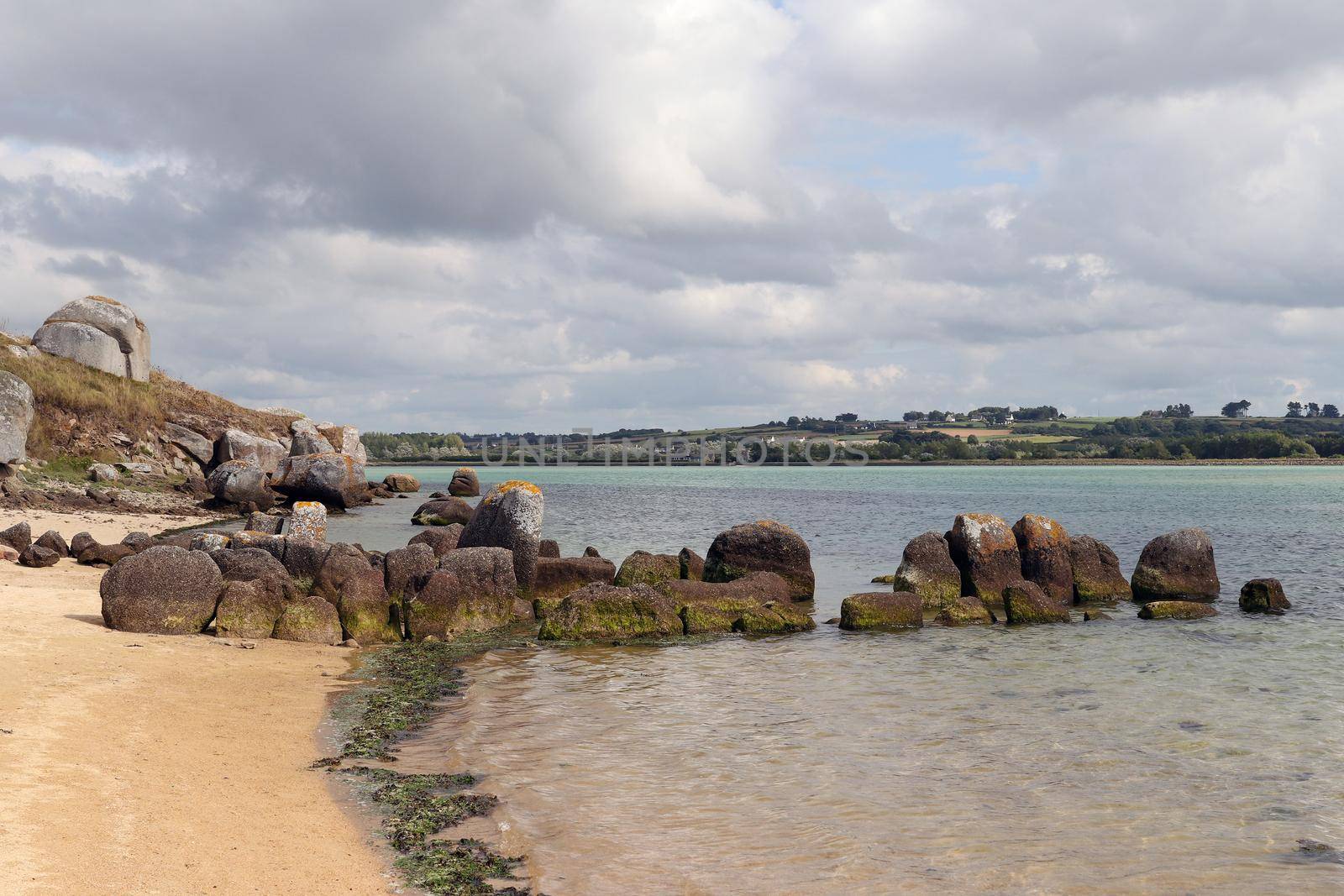 Ruins of the Dolmen of Guinirvit, Bay of Kernic, Plouescat, Finistere, Brittany, France by Mibuch
