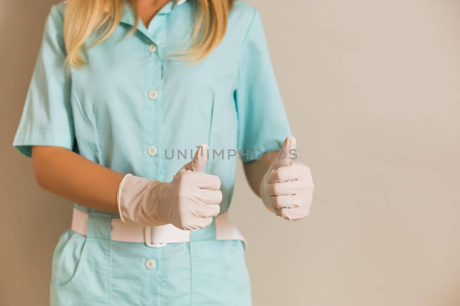 Medical nurse showing thumbs up by Bazdar