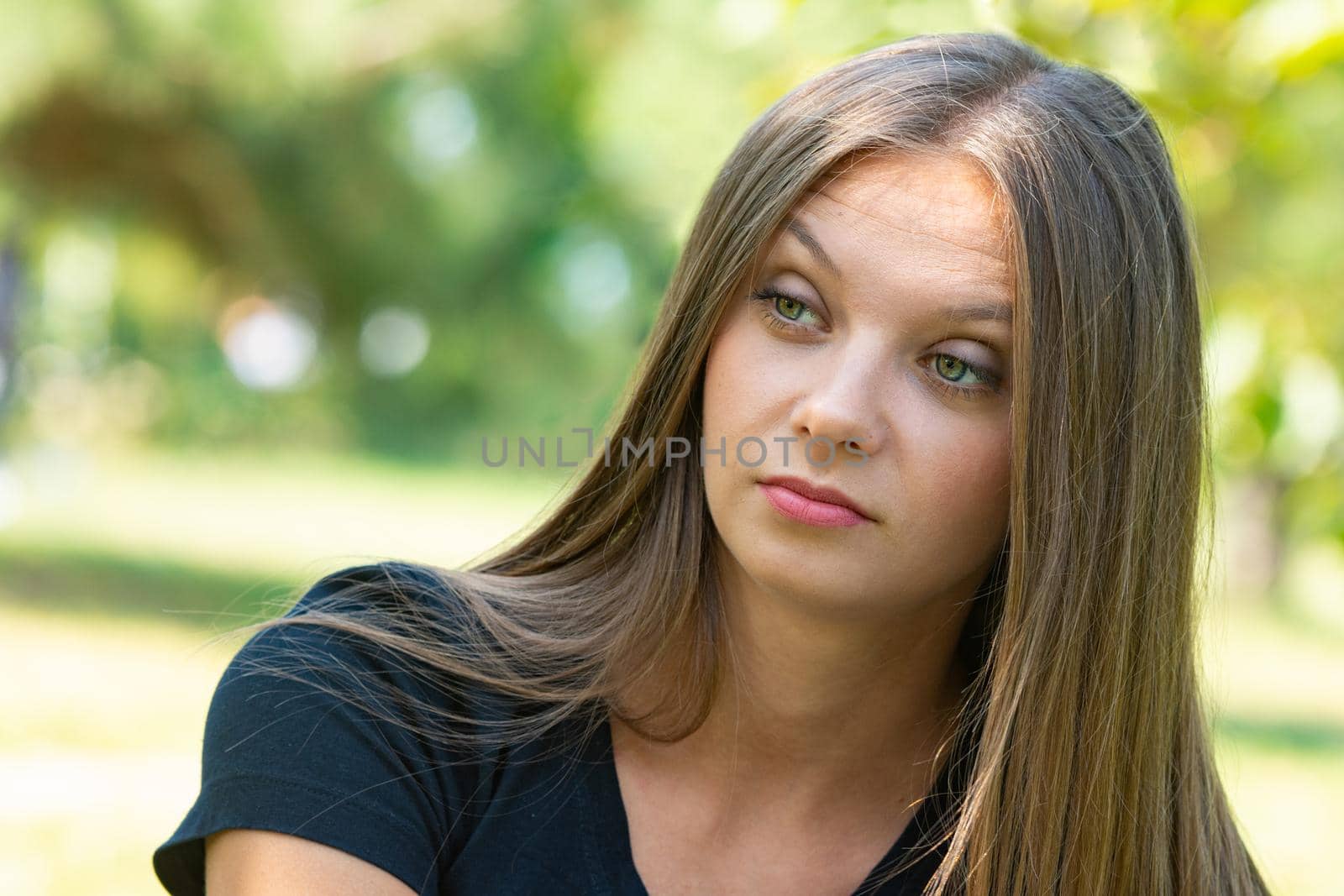 Surprised and perplexed look of a girl, close-up portrait