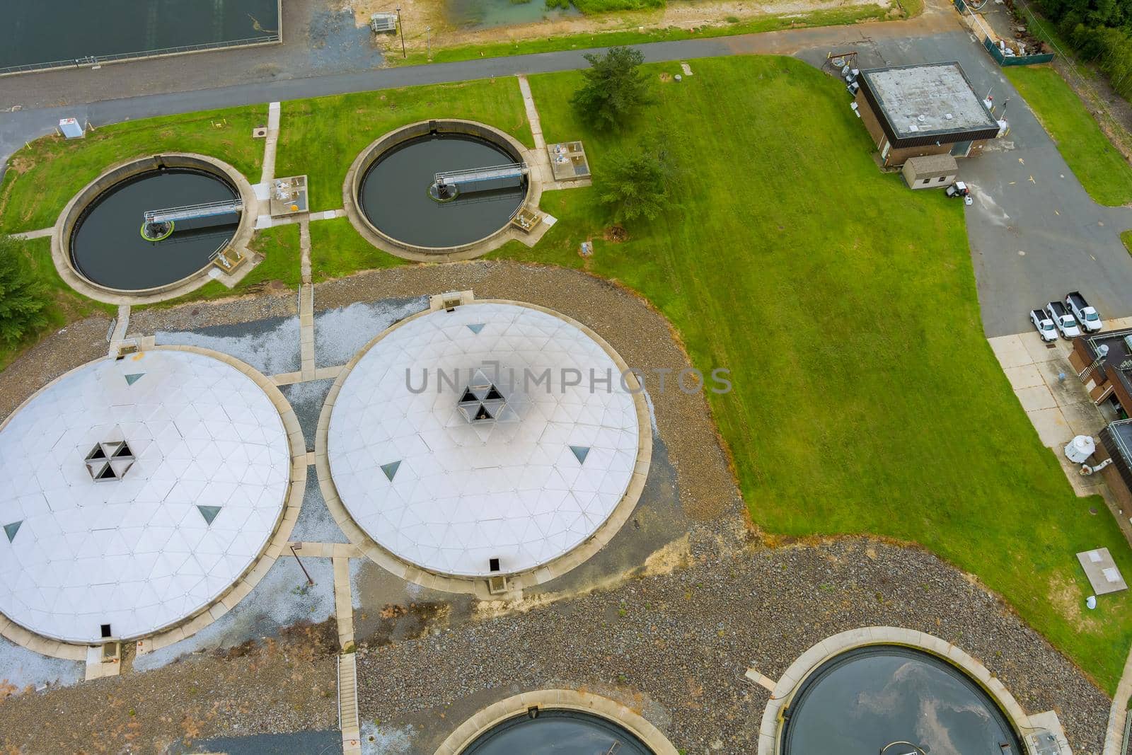 Aerial view of modern industrial water sewage treatment plant by ungvar