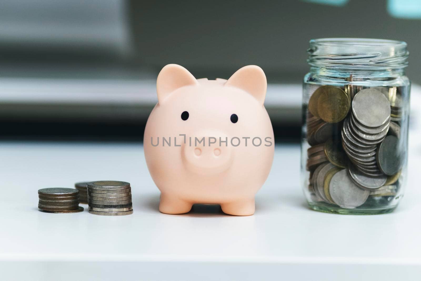 Finnace , Saving money and investment concepts. Piggy bank and coin.