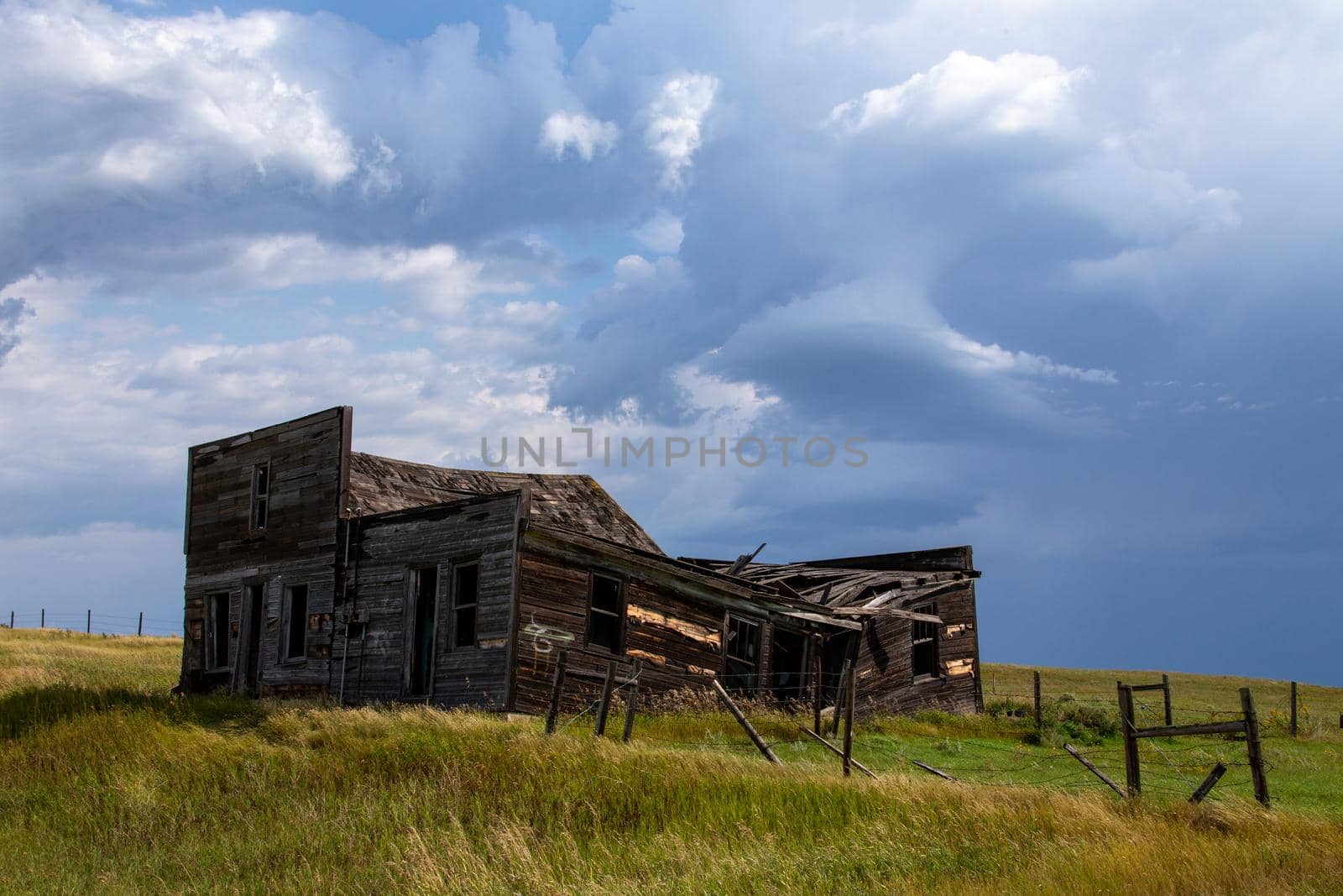Prairie Storm Canada Summer time clouds abandoned building