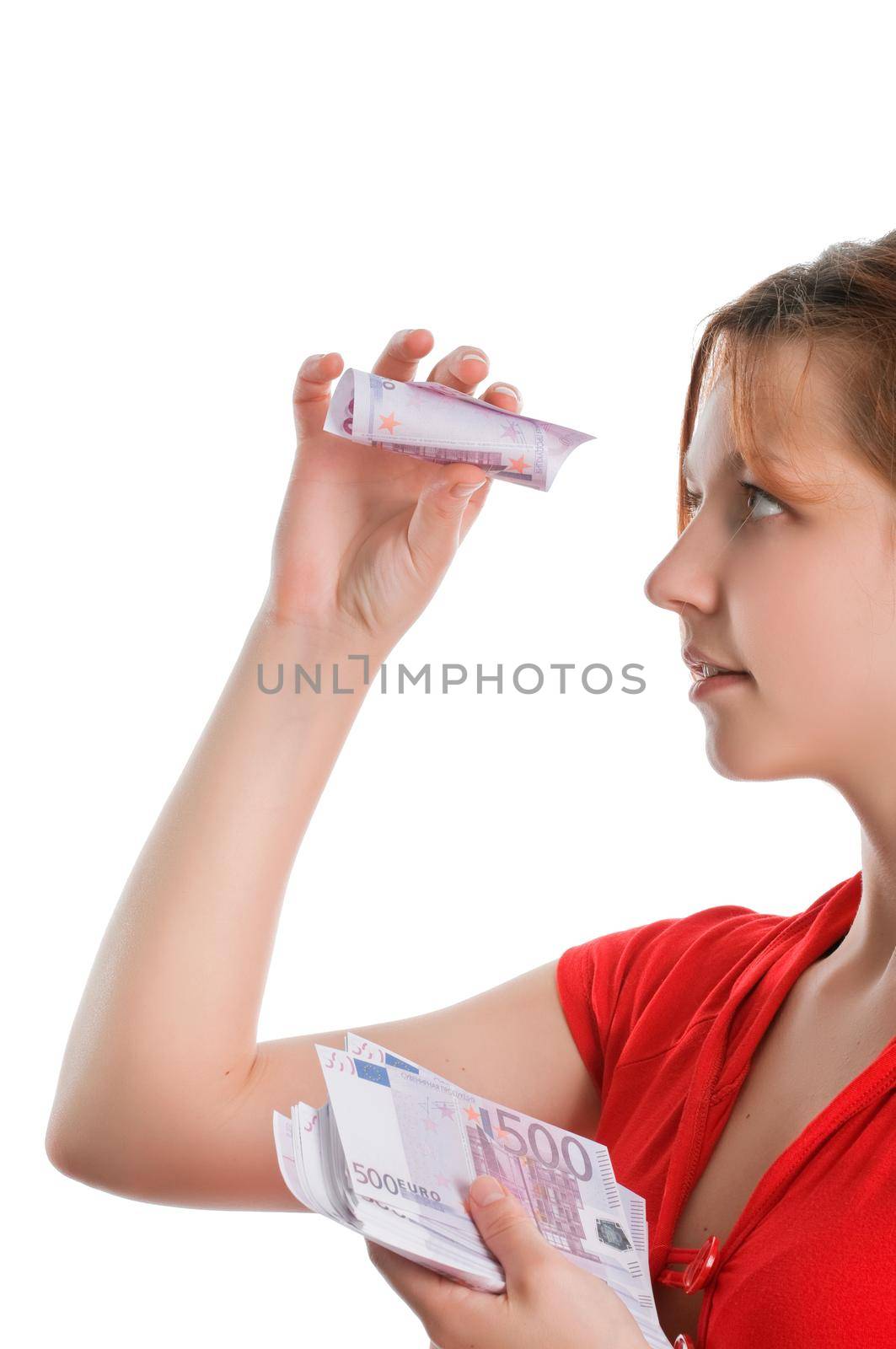 Girl with lots of euros isolated on white