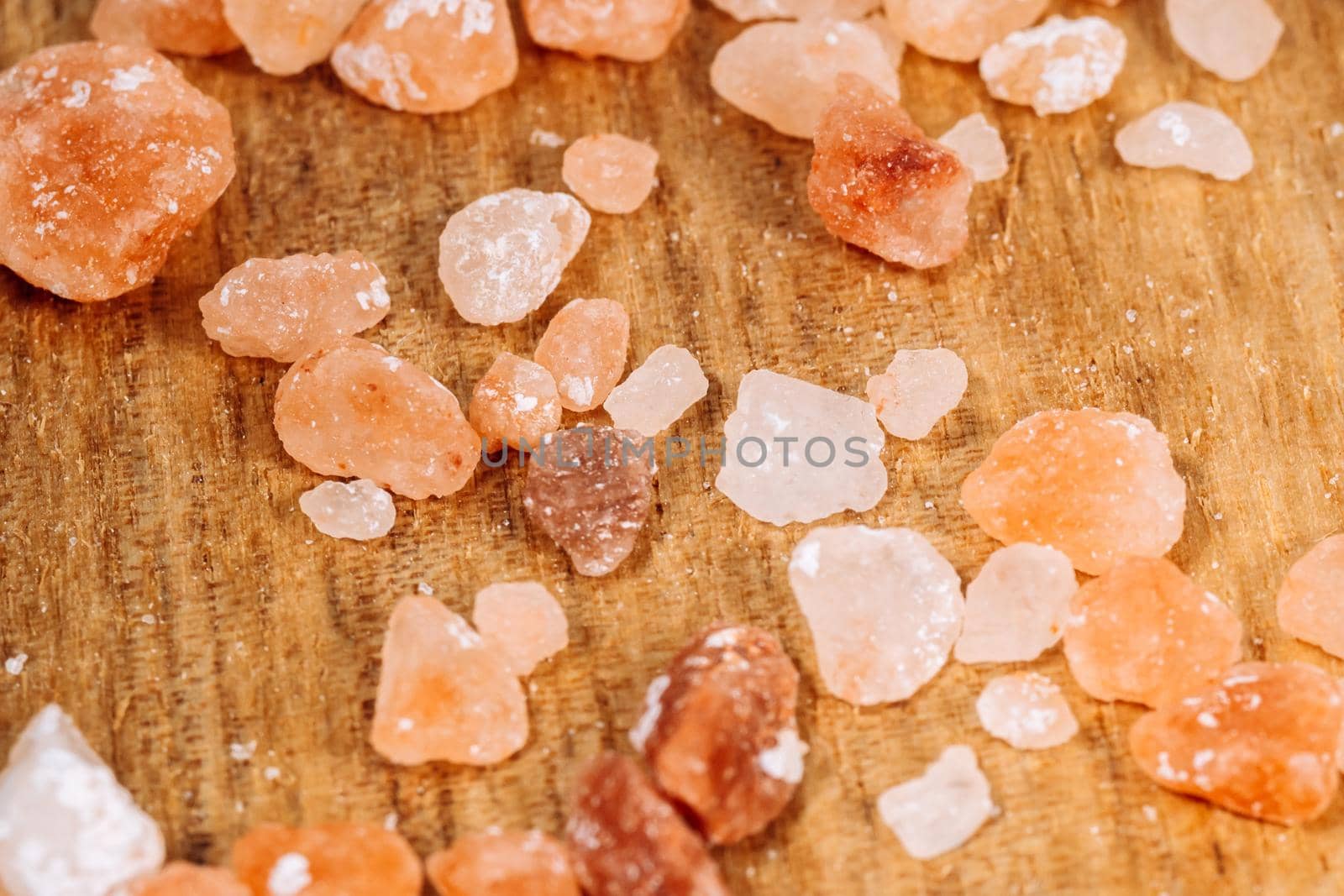 Himalayan pink salt close-up macro a wooden background by darksoul72